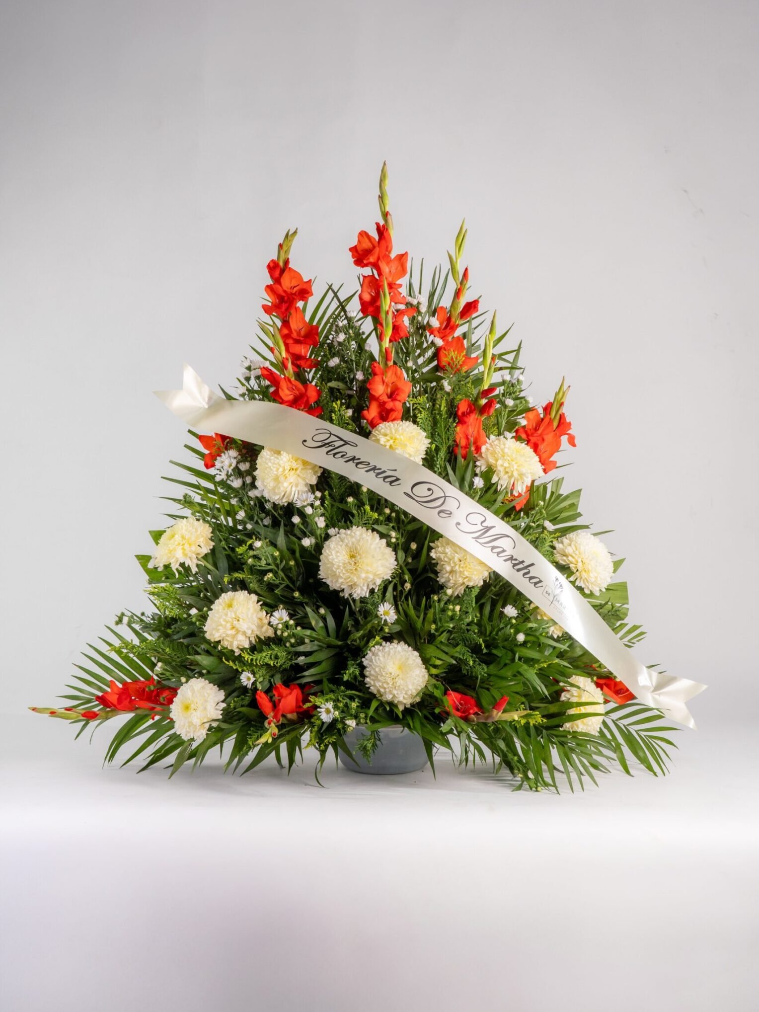 Arreglo Gladiolas Rojas con Polar